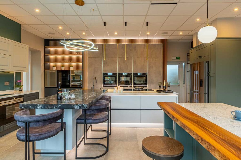 handleless kitchen display with marble breakfast bar