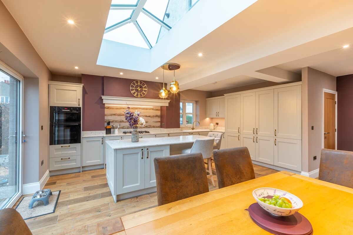 Traditional white shaker style kitchen with island