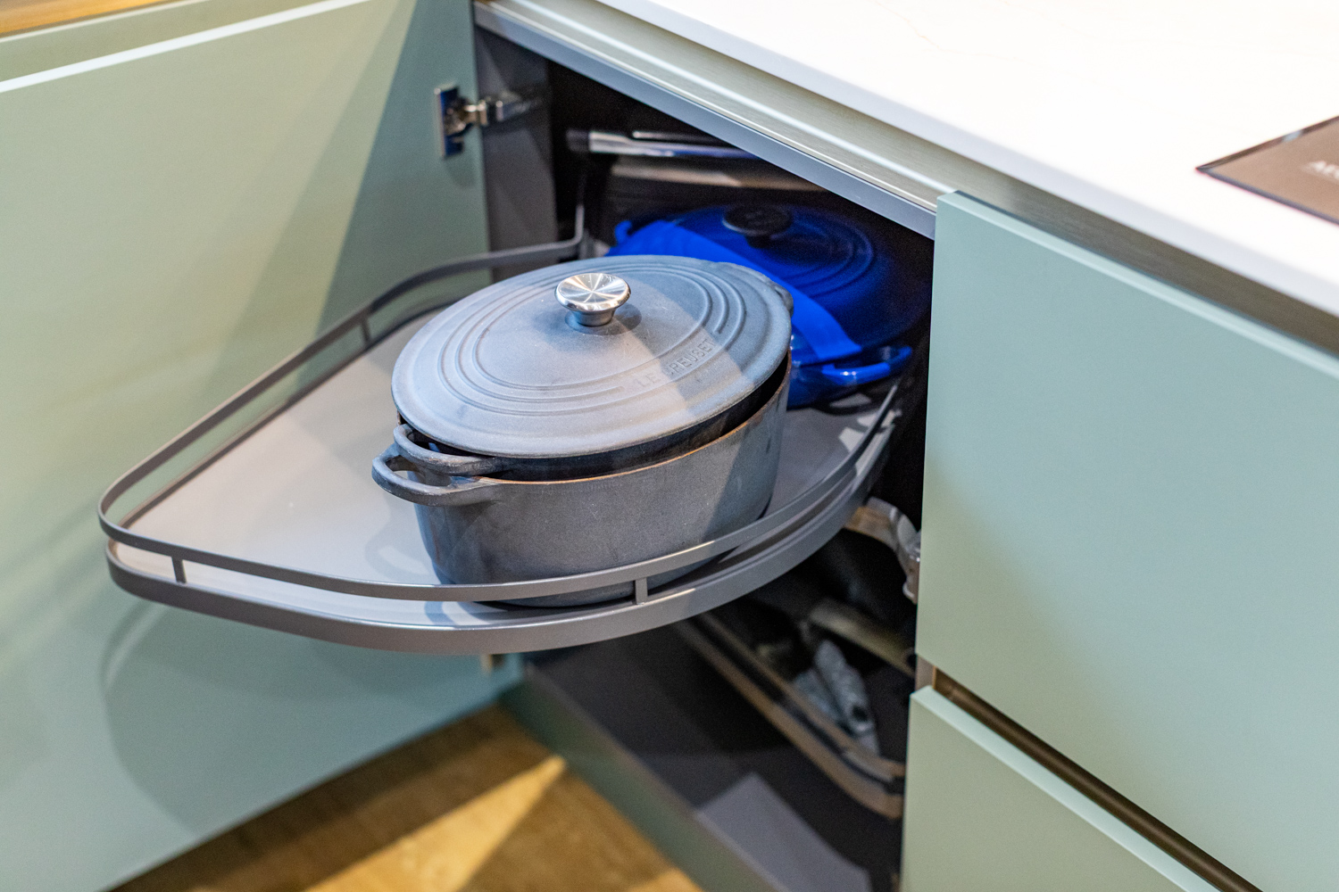 Modern kitchen with handleless design and sleek storage - Atlantis Kitchens