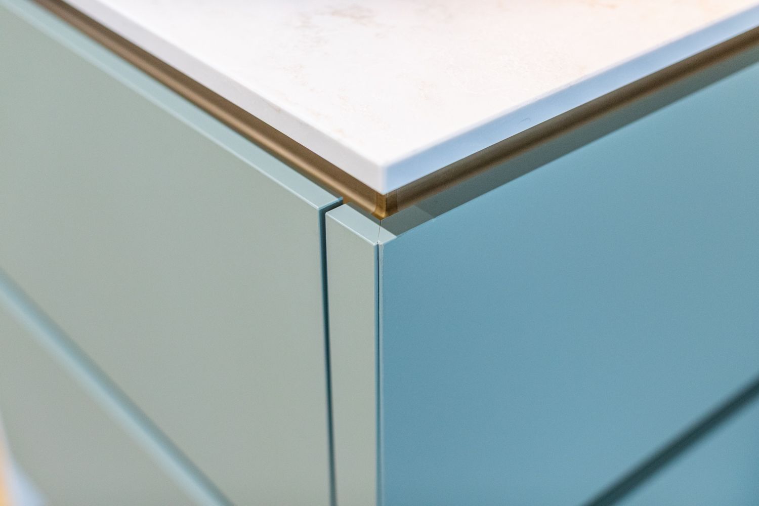 Modern kitchen with handleless design and sleek storage - Atlantis Kitchens